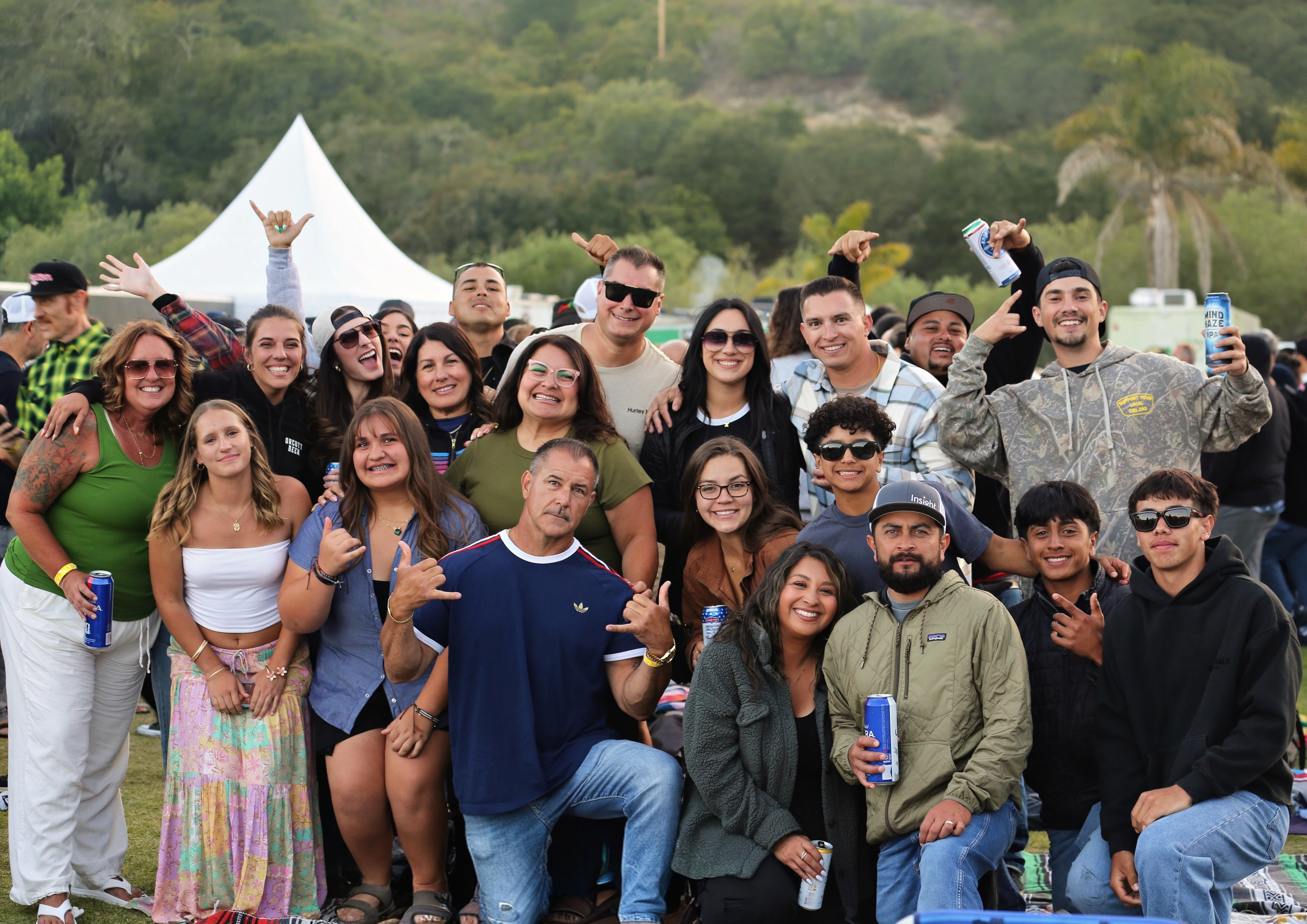 Large multi-generational group photo at the show