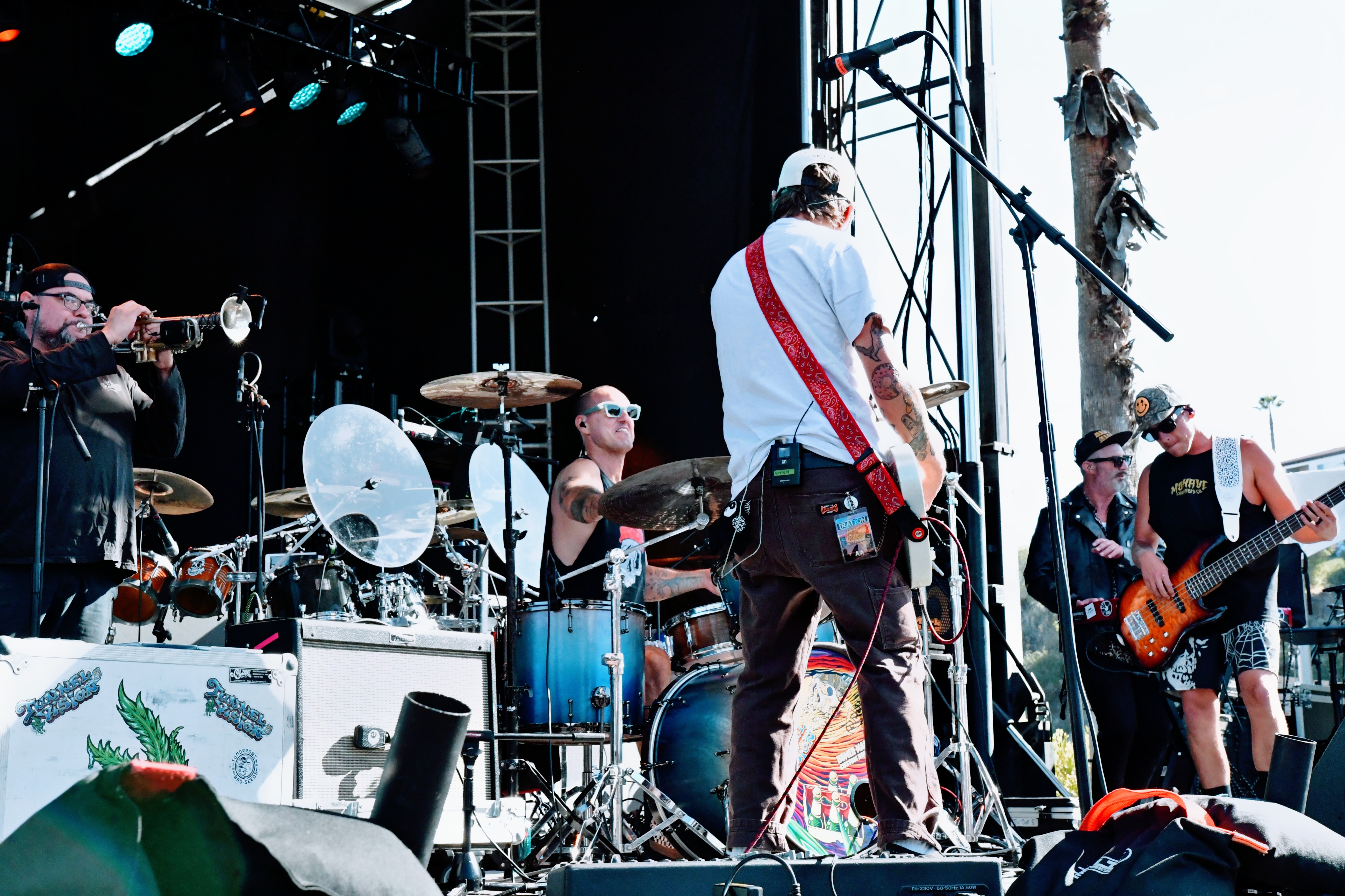Tunnel Vision performing on stage with horns section