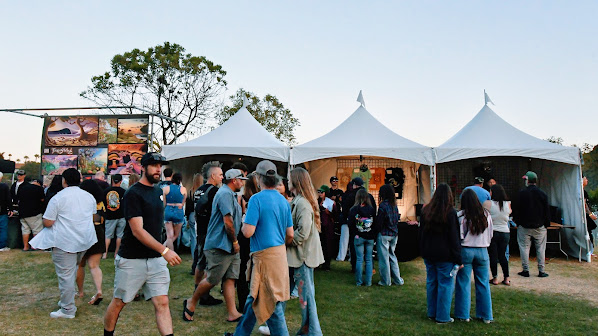 Vendor tents at dusk