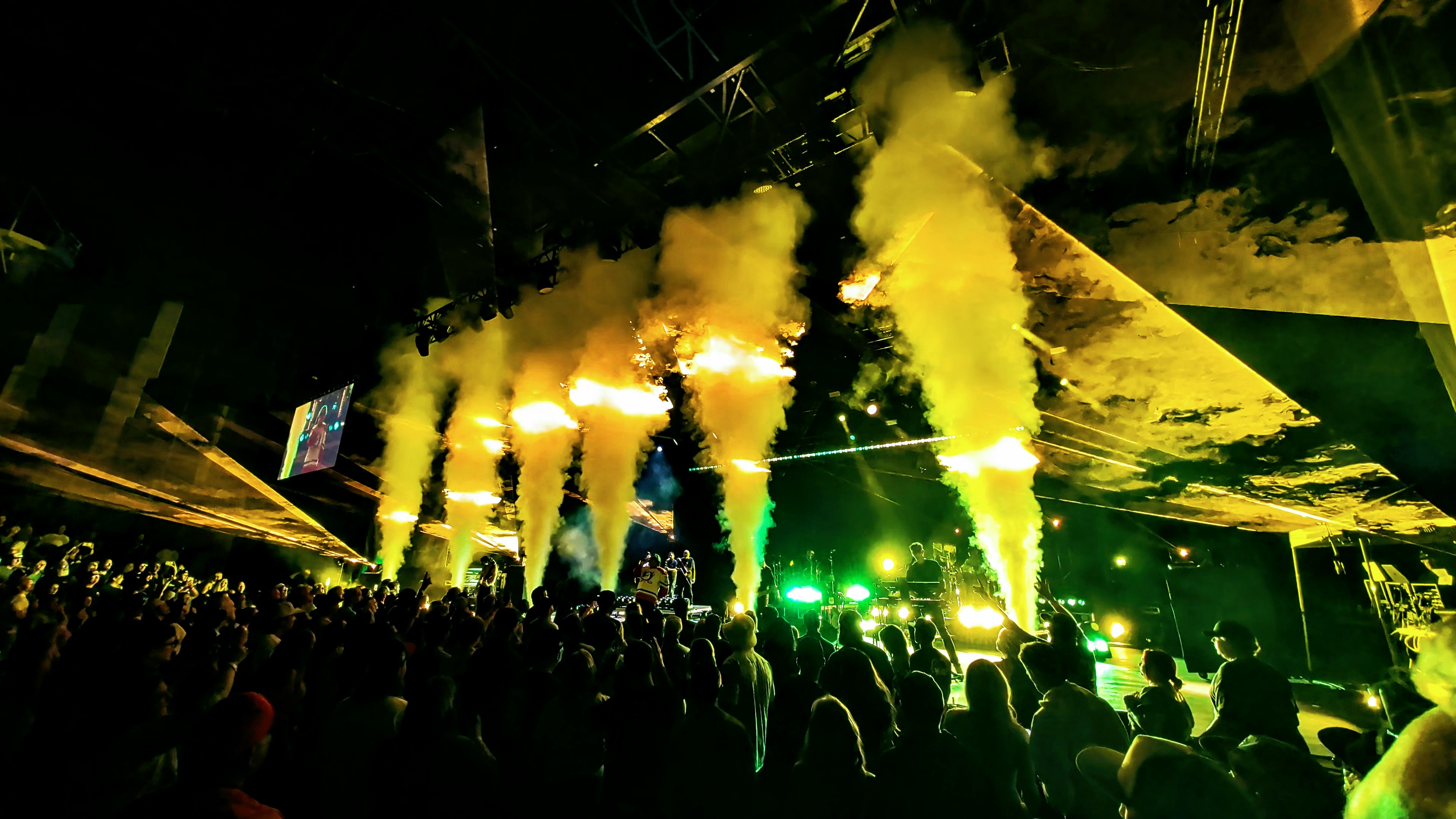 Smoke cannons and lasers filling the stage during The Elovaters finale